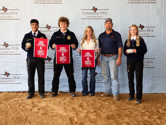 Wyatt Orsak; Bought by Nelson Earthworks for $2,500. Pictured with Javier Mendoza, Alyssa Nelson, Brent Nelson and Alley Fitzgerald.