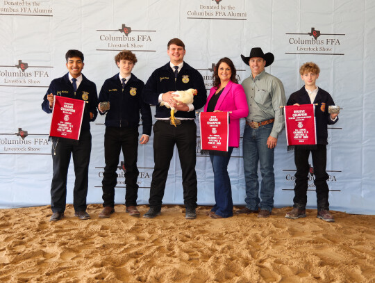 Jayden Trapp; Bought by JW and Natalie Wright for $10,100. Pictured with Javier Mendoza, Ross Heffley, Natalie Wright, JW Wright and Ryan Heffley.