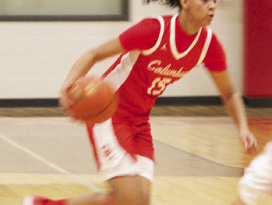 Anaya Gardner running by a defender and driving the line for a contested layup and drawing a foul.