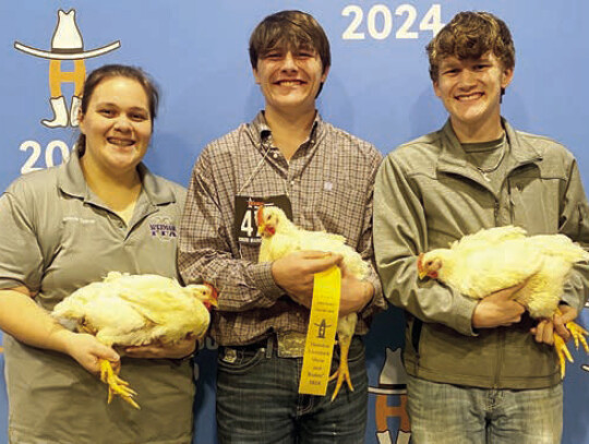 Pictured from left are poultry participants Amanda Spacek, Hunter Simon, and Bralen Heger.