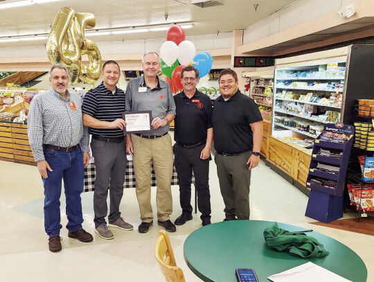 Pictured from left is Produce Merchandiser Mike Staake, VP Mitch Carroll, Produce Manager Stephen Vasek, Store Director Andrew Wanko and District Director Jose Lopez. Courtesy photo