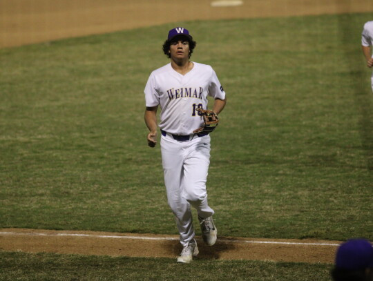 Nichalos Vasquez running off the field after throwing the runner out at first on a routine ground ball. Citizen | Evan Hale