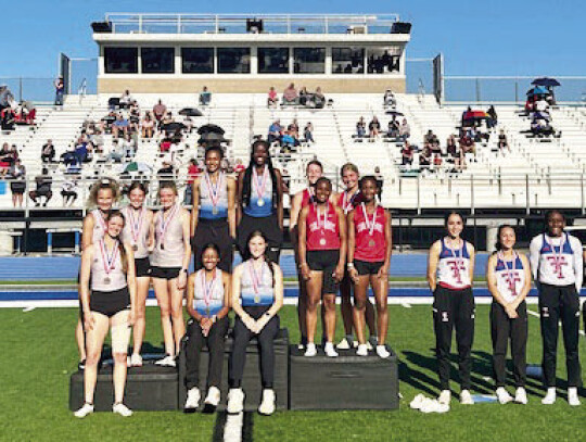 Scarlett McClelland (top left), Taylor Morrow, Katlyn Torres (bottom left) and Faith Cleveland posing after coming in 2nd for the 4x100m. Photo courtesy of Kayley Johns