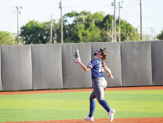 Kasey Eggeymeyer getting under a fly ball to secure an out for the Lady Raiders.