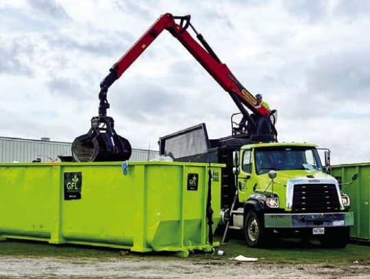 Large trash receptacles were provided for residents participating in Eagle Lake’s Trash Off Day.